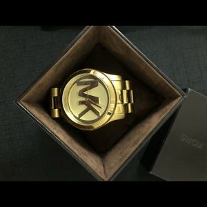 Gold, oversized Michael Kors watch